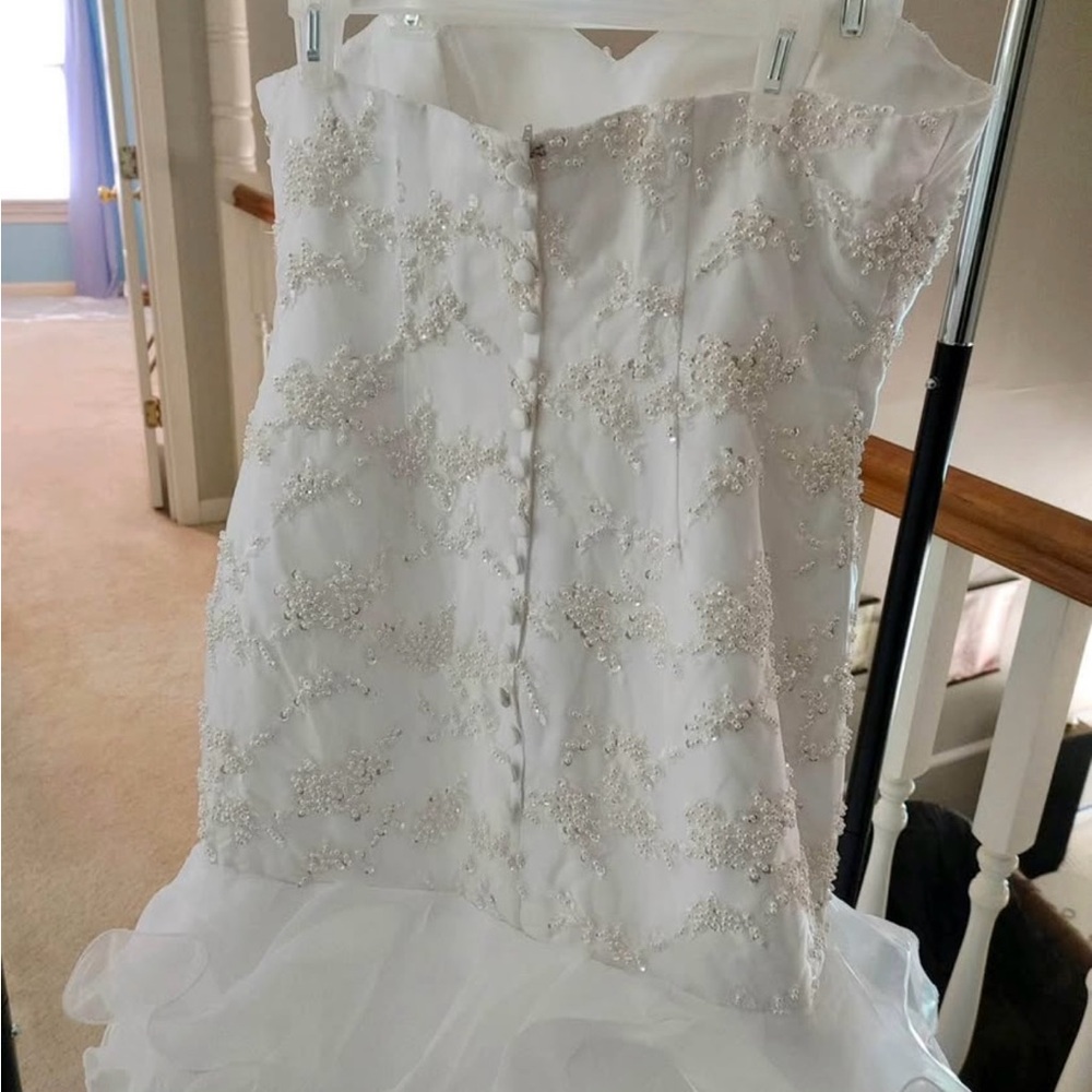 Size 16 never worn custom wedding dress